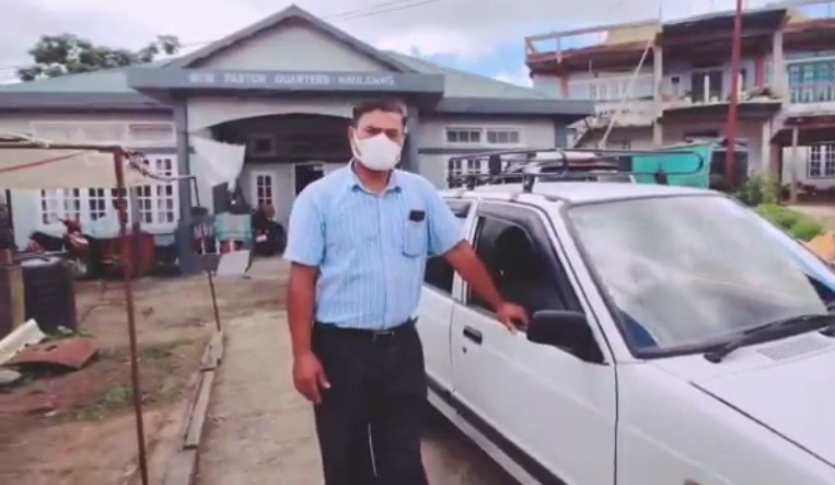 Israel Lalremtluanga, a pastor of Baptist church in southern Mizoram's Lunglei district, drives people to their villages and homes in his own car.
